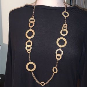 Gold tone necklace (doubles as belt)